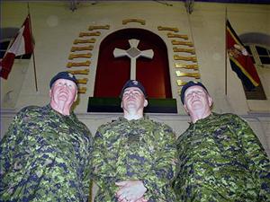 Outgoing honourary Lt.-Col Jim McQueen, left, Col. Andrew Samis and John Scott Cowan,