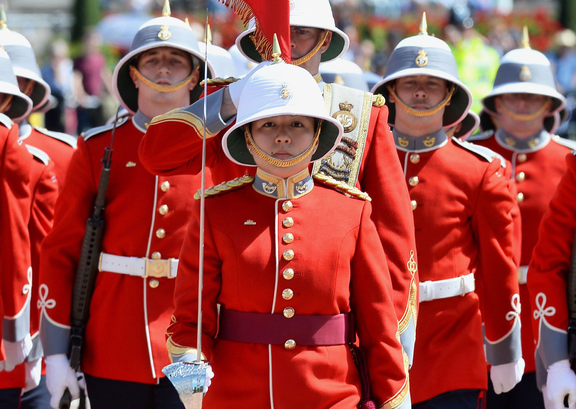 Captain Megan Couto (C) of the 2nd Battalion, Princess Patricia's Canadian Light Infantry (PPCLI) leads her battalion to makes history as the first woman to command the Queen's Guard at Buckingham Palace in central London on June 26, 2017.  / AFP PHOTO / POOL / John StillwellJOHN STILLWELL/AFP/Getty Images