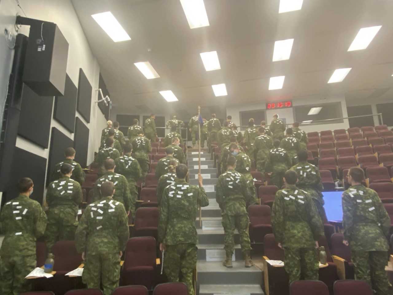 a group of ocdt's in a lecture hall participating in Resilience Plus activities