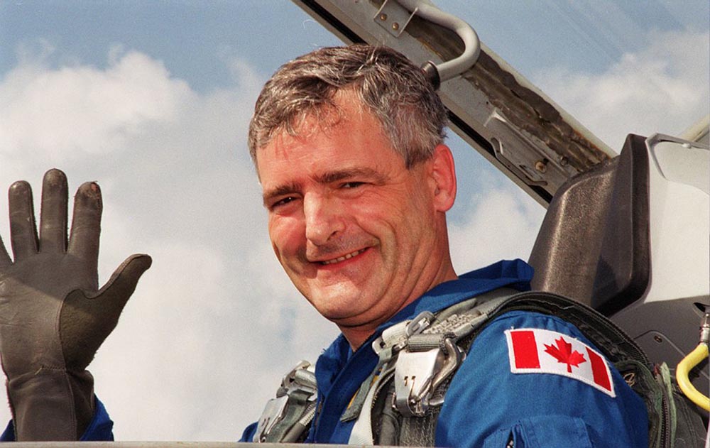 Mission-Specialist-Marc-Garneau-arrives-at-the-Shuttle-Landing-Facility-aboard-a-T-38-jet-aircraft-NASA-photo-1