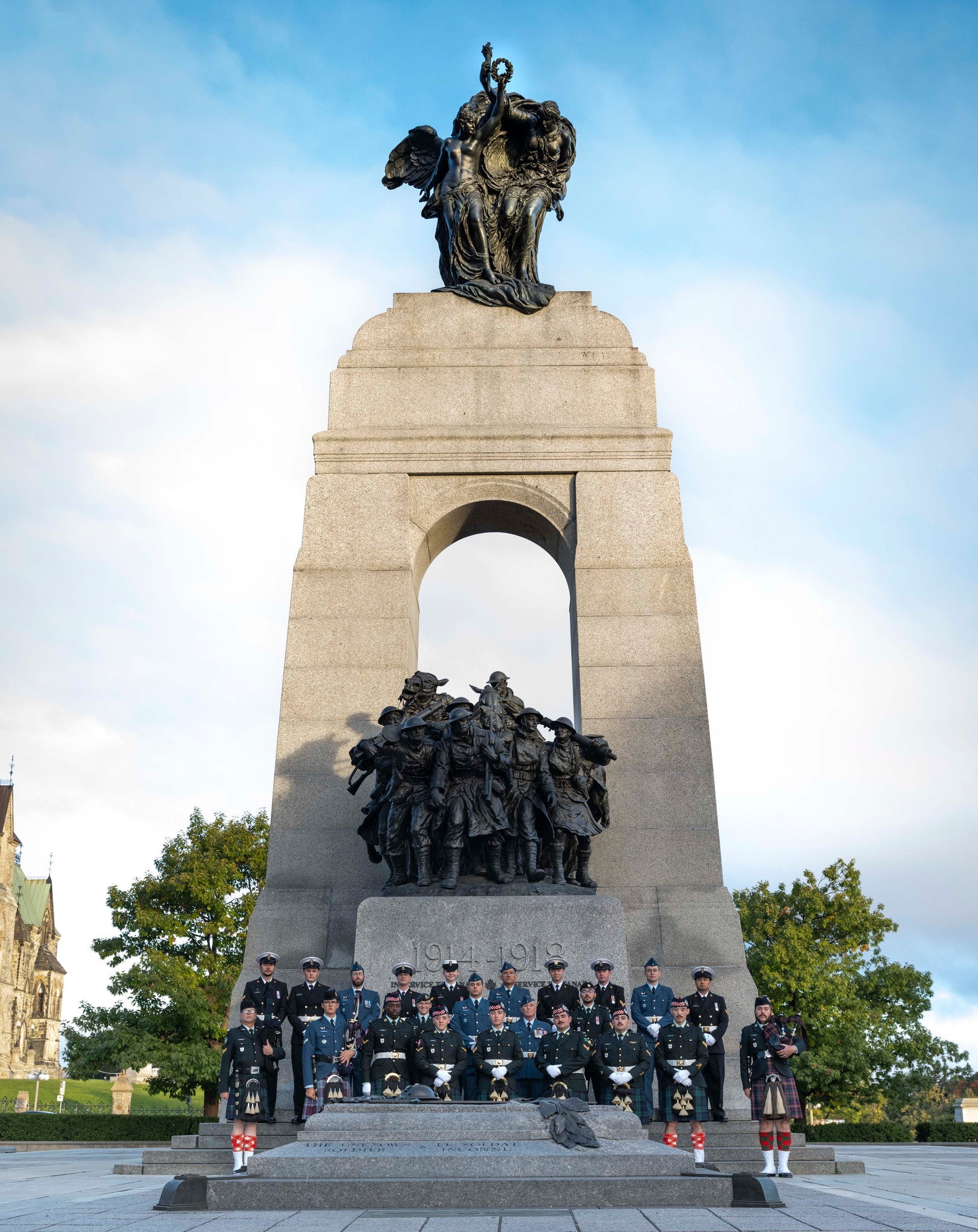 Canadian Armed Forces members stand in front of the National War Memorial, Tomb of the Unknown Soldier, for the Rotation 3 National Sentry Program. Located in Ottawa, Ontario on 15 October, 2024.

Photo credit: Aviator Alexander Ward, Canadian Armed Forces Imagery Technician.