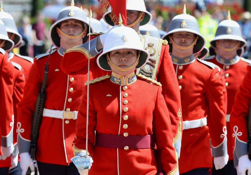 Captain Megan Couto (C) of the 2nd Battalion, Princess Patricia's Canadian Light Infantry (PPCLI) leads her battalion to makes history as the first woman to command the Queen's Guard at Buckingham Palace in central London on June 26, 2017.  / AFP PHOTO / POOL / John StillwellJOHN STILLWELL/AFP/Getty Images