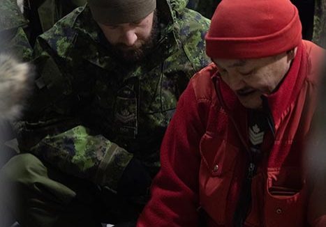 Candidates on the Arctic Operations course learn how to construct toboggans from members of the Canadian Forces Rangers in Resolute Bay, Nunavut on 19 February, 2022.

 Credit: S1 Larissa De Guzman, Canadian Armed Forces Imagery